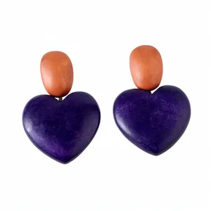 Handcrafted vintage-style wooden heart drop earrings with purple and tan elements