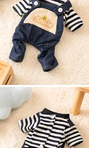 Detailed view of stylish dog denim overalls with Smile embroidery and snap buttons