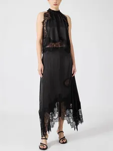 Professional side profile of elegant black sleeveless lace two-piece set with irregular hem