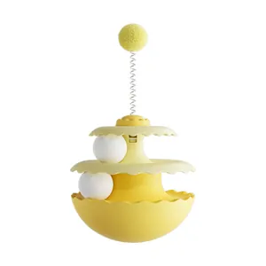 Jouet interactif culbuto jaune pour chat avec pompon sur ressort et billes roulantes