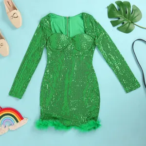 Sexy green sequin mini dress featuring long sleeves and lush green feather trim hemline