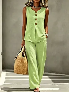 Women's sleeveless V-neck button top and wide-leg pants two-piece set in lime green.