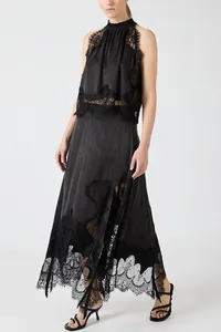 Elegant black lace two-piece set with sleeveless halter top and high slit skirt detail.