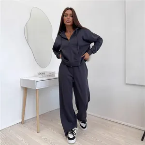 Women's 2-piece tracksuit set featuring long sleeve zip hoodie and wide-leg sweatpants