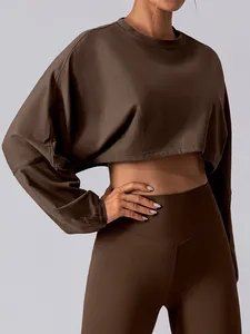 Women's minimalist brown loose long sleeve yoga crop top with matching leggings set