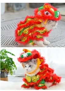 Detailed view of a cat wearing a traditional red lion dance costume for Chinese New Year
