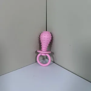 Pink TPR rubber textured pacifier dog chew toy for dental molar cleaning and play