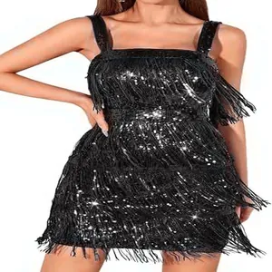 Close-up of black sequin fringe dress showing shimmering texture and layered tassels.