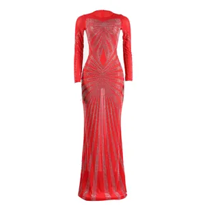Front view of a glamorous red floor-length gown with silver rhinestone sunburst pattern