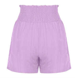 Close-up view of lavender high-waist smocked shorts with textured vertical stripes