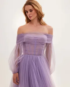 Detailed view of lavender off-the-shoulder tulle gown with corset bodice and sheer sleeves
