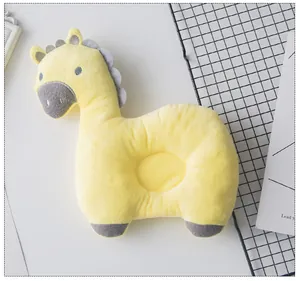 Soft yellow giraffe plush pillow detail for pets and babies in a minimalist setting