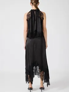 Back view detail of black sleeveless lace two-piece set showing intricate floral lace trim
