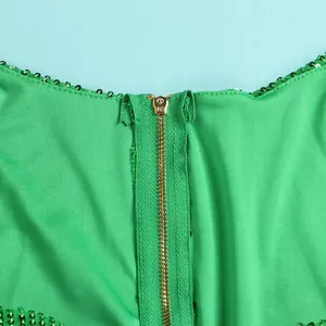 Detailed view of gold zipper on green sequin bodycon party dress for women