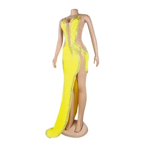 Sexy yellow evening dress with hot rhinestone detailing and sheer mesh side panels