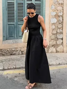 Elegant black retro Hepburn style knitted tank maxi dress for a chic spring street look