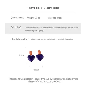 Detailed specs of vintage wooden heart stud earrings with 6.7cm height and 4.5cm width