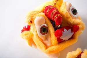 Macro view showing the intricate plush details of a festive Chinese lion dance pet costume