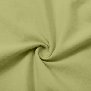 Close-up of light green breathable cotton linen fabric texture for women's casual dress.