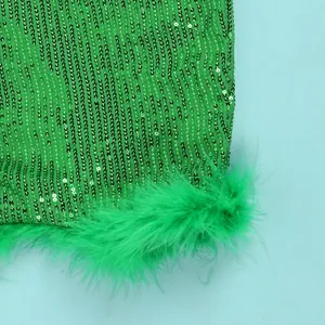 Close-up of green sequin fabric with fluffy feather trim on a sexy bodycon party dress.