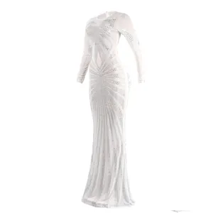 Elegant white floor-length gown featuring intricate silver rhinestone radial patterns.
