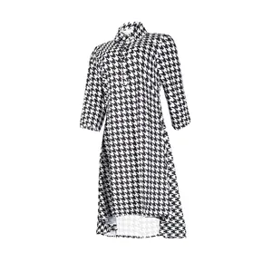 Stylish houndstooth dress featuring a slim fit and a classic shirt collar design