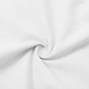 Detailed macro view of soft white cotton linen fabric texture for a women's dress.