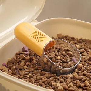 Pet food scoop with built-in desiccant compartment and clear measuring cup for cat dog food