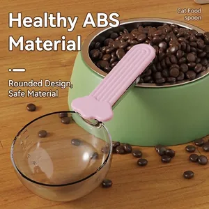 Durable pet food scoop with measurement scale and integrated handle clip for cat food