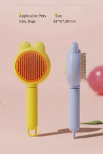 Front and side view of rabbit ear pet brush with stainless steel pins for grooming