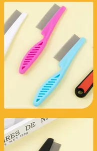 Close-up of colorful stainless steel pet flea combs with fine teeth for cats and dogs.