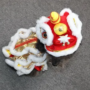 Traditional red and gold Chinese lion dance pet costume for festive New Year celebrations