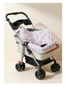 Close-up detail of purple floral pet stroller cushion set with delicate ruffled edges