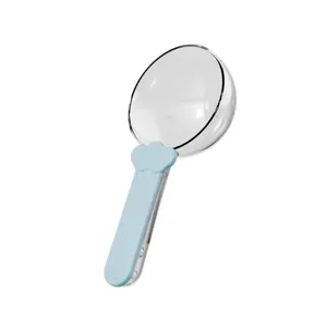 Transparent pet food scoop with a light blue handle clip for measuring dog or cat food.