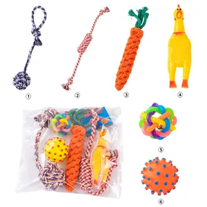 Detailed macro view of 6-piece pet toy set including cotton rope knots and squeaky chicken