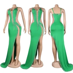 Detailed views of a sexy green rhinestone mesh evening dress with a high side slit.