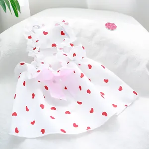 Adorable white pet princess dress with red heart prints and large pink bow for small dogs