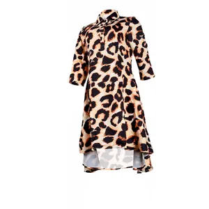 Detail view of a stylish leopard print dress with a lapel collar and asymmetrical hem.