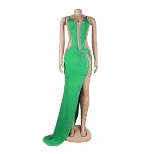 Detail showing bright green evening dress with rhinestones and sheer mesh panels