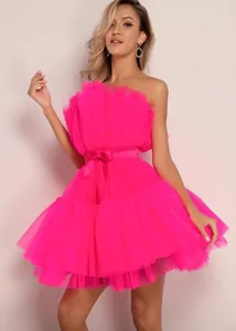 Stunning hot pink strapless tulle mini dress featuring a bow waist and ruffled skirt