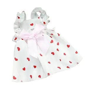 Sweet pet summer dress with red heart prints and a large pink bow for small dogs.