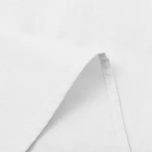 Close-up macro view of high-quality white cotton linen fabric texture and stitching detail.