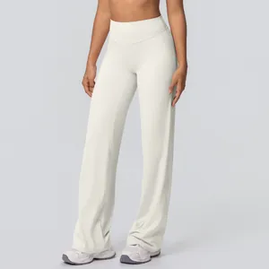 Detail view of cream high-waisted yoga flare pants with double-sided brushed fabric.