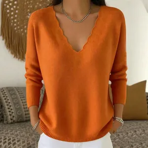 Cozy orange V-neck loose knitted sweater for women, perfect for autumn winter casual fashion