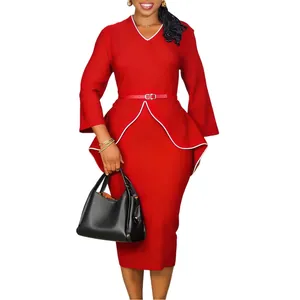 Detail of elegant red peplum long-sleeved dress with white piping and slim red belt
