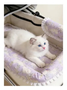 Detail view of purple floral pet stroller liner set with a white cat