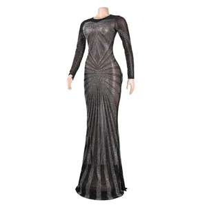 Sexy black sheer floor-length evening dress with intricate silver rhinestone patterns