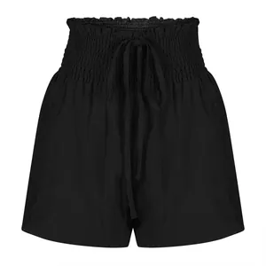 Detailed view of women's black high-waisted shorts with smocked elastic waistband