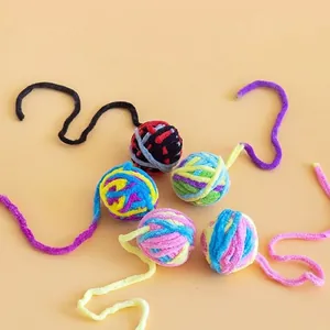 Colorful plush yarn ball cat toys with tails for interactive play and exercise