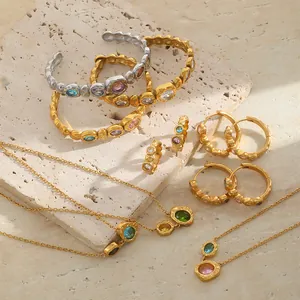 Detail view of retro hammer-textured jewelry set with colorful gemstones